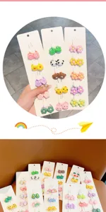 Set di elastici per capelli per bambini con simpatici disegni di fiori e animali per bambine.