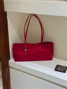 Red minimalist shoulder tote bag, stylish underarm handbag with heart key charm daily use.