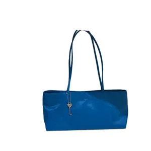 Blue shoulder tote bag for women, simple casual underarm handbag with heart key charm.