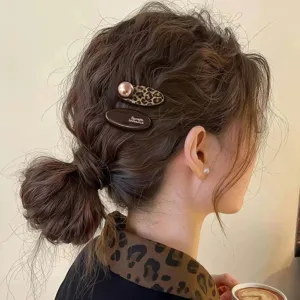 Leopard print hair clip set with pearl accent and engraved barrette for women daily wear.