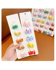 Simpatici elastici per capelli da bambina, fermagli colorati con decorazioni di animali e fiocchi.