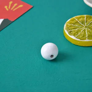 White wooden beads for DIY jewelry making, smooth round spacer beads for crafts and threading.