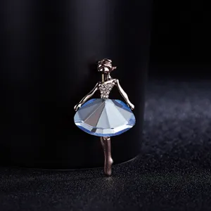 Detailed view of the elegant dancing girl brooch featuring sparkling rhinestones and a blue crystal skirt.