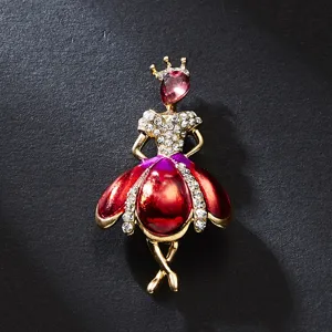 Exquisite rhinestone dancing girl brooch detail, gold-tone alloy with bright enamel.