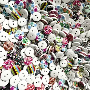 Detail shot of mixed wooden buttons featuring colorful floral, animal and geometric prints.