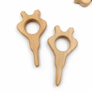Detail view of wooden animal baby teether, natural beech wood infant molar toy for kids