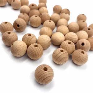 Natural beech wood round loose beads for DIY pacifier clips and jewelry making accessories.