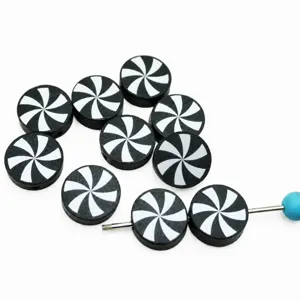 Black and white swirl pattern wooden beads, DIY craft jewelry accessories, product detail view.