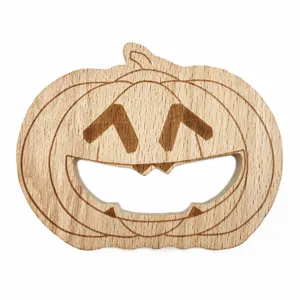 Wooden pumpkin teething toy, natural beech wood baby teether, cute carved design for infants.