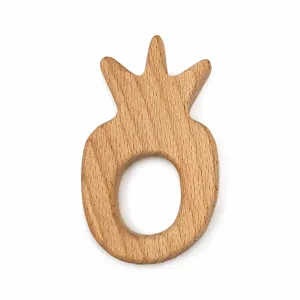 Beech wood baby teether detail shot, natural organic teether toy for infants, smooth surface.