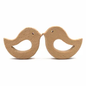 Natural beech wood bird teether detail, safe baby teething toy for infants, smooth polished.