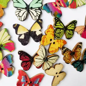 Close up of colorful butterfly wooden buttons with two holes, ideal for diy sewing crafts.