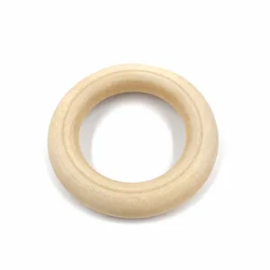Natural wooden ring for DIY crafts, bag buckles and curtain rings. Smooth unfinished wood surface.