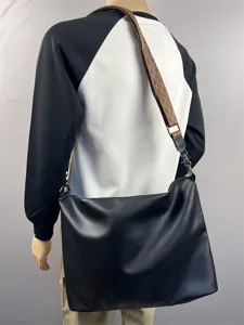 Men large capacity black crossbody shoulder bag detail view with patterned wide strap.