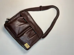 Dark brown Japanese style messenger bag, casual crossbody bag with front pockets and flap.