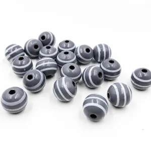 Close-up details of 16mm striped wooden beads featuring center holes for handmade DIY crafts.