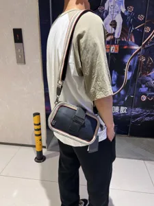 Men women retro striped crossbody shoulder bag detail view fashion casual outdoor daily use bag.
