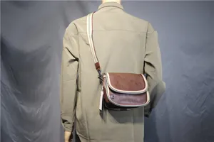 Casual canvas messenger bag for men and women stylish crossbody shoulder bag with striped strap.