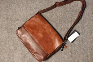 Men vintage brown leather messenger bag cross body shoulder casual bag detail view shot