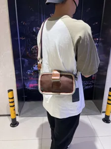 Men's retro stripe crossbody bag with buckle, casual outdoor single shoulder messenger bag.