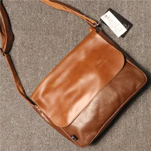 Men vintage brown PU leather messenger bag casual shoulder cross body bag for daily use.