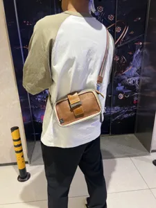 Vintage retro stripe crossbody bag for men and women, stylish shoulder messenger bag with buckle.