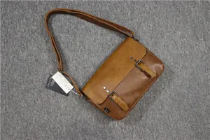 Men vintage PU leather messenger bag casual retro flap crossbody shoulder bag with buckle.