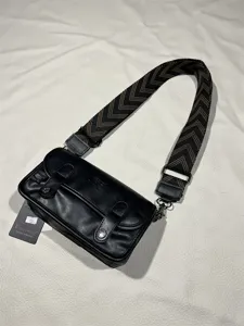Three-box vintage black crossbody bag with wide strap, trendy street style shoulder bag for daily use.