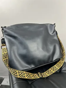 Stylish large capacity mens crossbody bag with patterned shoulder strap for daily travel use.