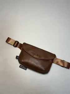 Retro brown PU leather men waist bag stylish casual sling crossbody bag for daily streetwear.