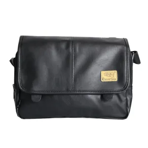 Vintage black leather messenger bag for men, stylish retro casual shoulder bag for use.