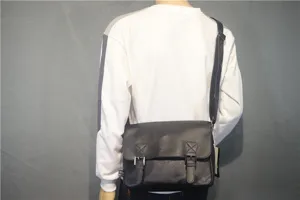 Retro black leather messenger bag for men, casual crossbody school shoulder bag style.