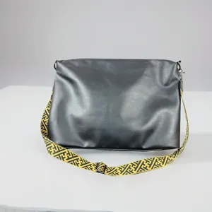 Stylish large capacity men's messenger bag with yellow geometric strap for casual daily travel use.