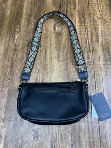 Detailed view of a black crossbody bag with ethnic wide strap and metal hardware.