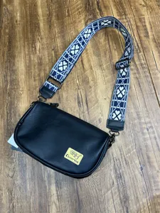 Black crossbody bag with wide patterned strap, stylish shoulder bag for daily casual use.