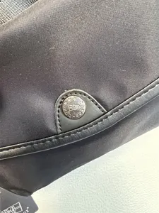 Threebox men's casual nylon crossbody shoulder bag detail view featuring metal snap button.