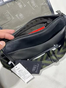 Three-box retro black crossbody bag detail view featuring durable PU leather and adjustable strap.
