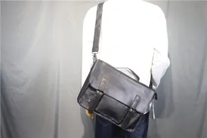 Men's black PU leather messenger bag, retro casual crossbody shoulder bag for business use.