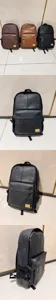 Zaino casual vintage in ecopelle PU per uomo e donna, pratica borsa per laptop e scuola.