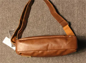 Brown vintage men's shoulder bag detail view, casual PU leather messenger bag style.