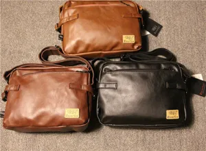 Detailed view of retro PU leather messenger shoulder bags showing multi-pocket design and texture.