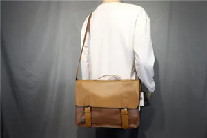 Detail shot of men retro PU leather messenger bag, business casual shoulder bag straps.