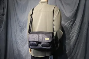 Men black messenger bag vintage crossbody shoulder bag with flap and dual front pockets.
