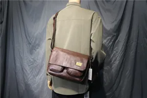 Retro brown PU leather messenger bag for men, vintage shoulder crossbody bag with flap detail.