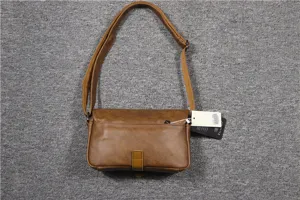 Retro brown leather crossbody bag for men and women, vintage small messenger shoulder bag.