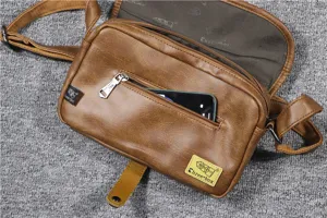 Detailed view of brown PU leather vintage casual crossbody mobile phone bag zipper pocket.