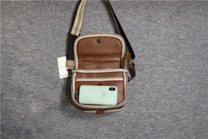 Vintage men's crossbody bag brown PU leather messenger bag with striped webbing shoulder strap.