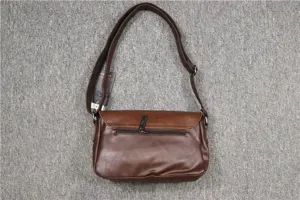 Brown PU leather men shoulder messenger bag detail view featuring flap closure and strap.