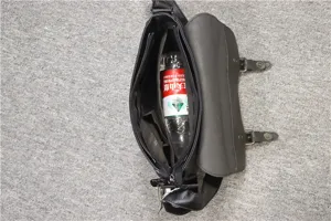 Detail view of the black retro messenger bag interior showcasing its spacious storage capacity.
