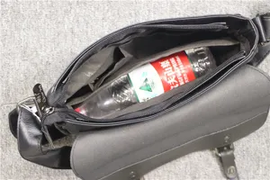 Detail view of men retro black messenger shoulder bag interior capacity showing zipper pocket.